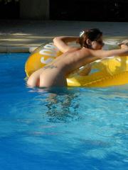 Candidium.com CDM 644 Brunette on the Beach and by the Pool 031.jpg image hosted at ImgAdult.com