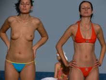 Nudistico.com Two Topless Girls in Blue and Orange Thongs 011.jpg image hosted at ImgAdult.com
